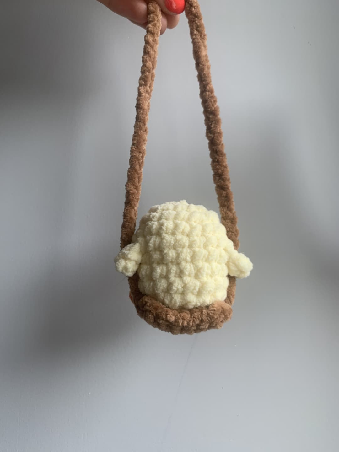 Image 3 de la variante Poussin balançoire